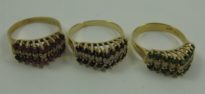 Appraisal: A SET OF THREE DIAMOND AND COLOR GEMSTONE RINGS K