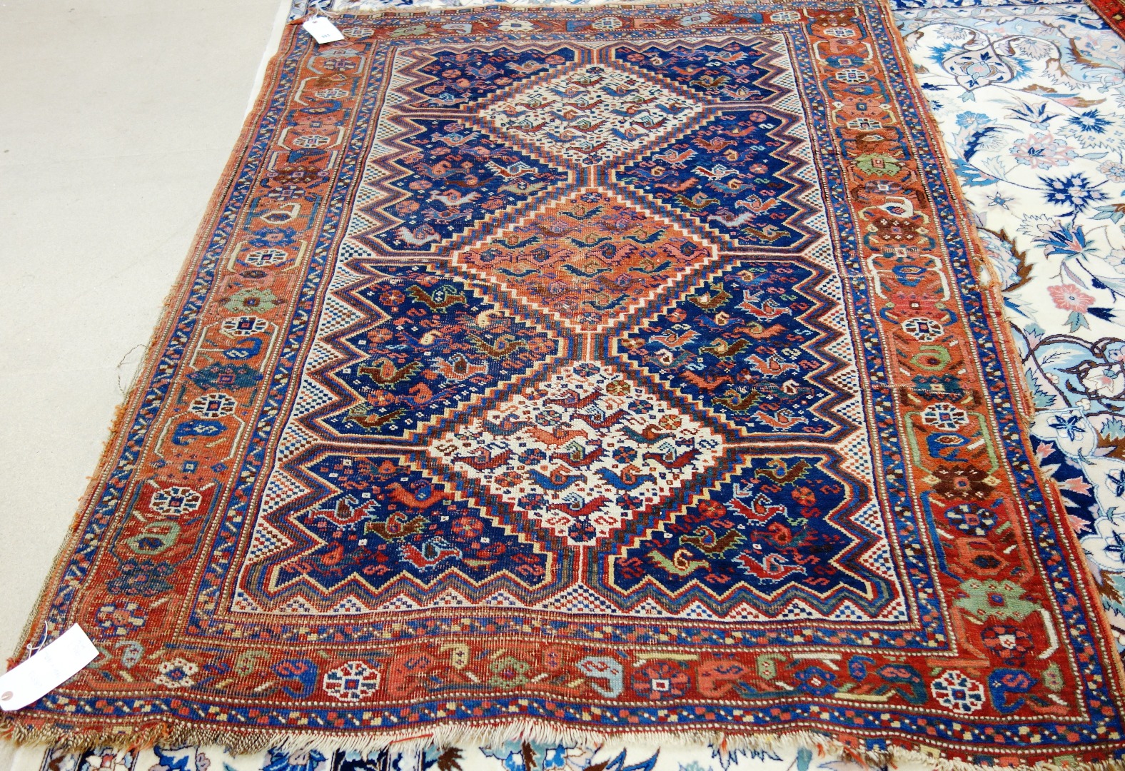 Appraisal: An Afshar Khamseh rug Persian the indigo field with a