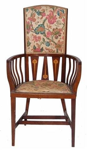 Appraisal: AN ART NOUVEAU MAHOGANY ELBOW CHAIR with stylised inlaid decoration