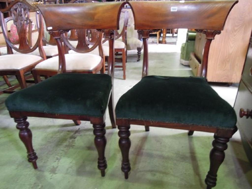 Appraisal: A pair of th century mahogany spade back dining chairs