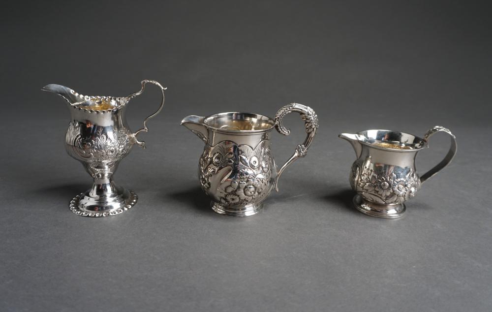 Appraisal: THREE ENGLISH STERLING SILVER CREAM PITCHERS OZTThree English Sterling Silver