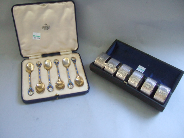 Appraisal: A set of six silver gilt and enameled coffee spoons