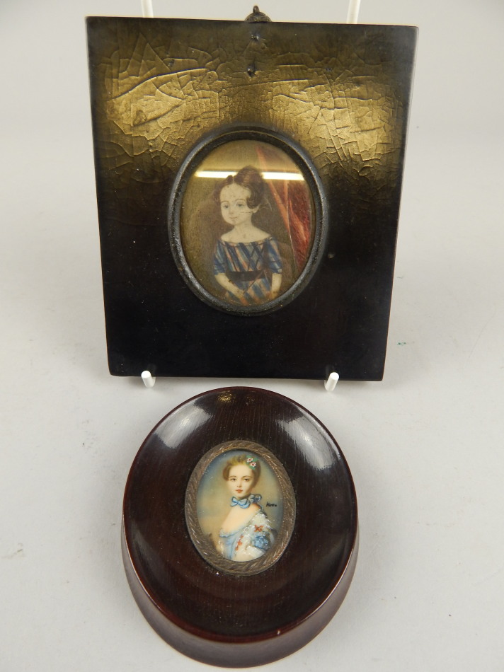 Appraisal: A thC portrait miniature of a young girl wearing a