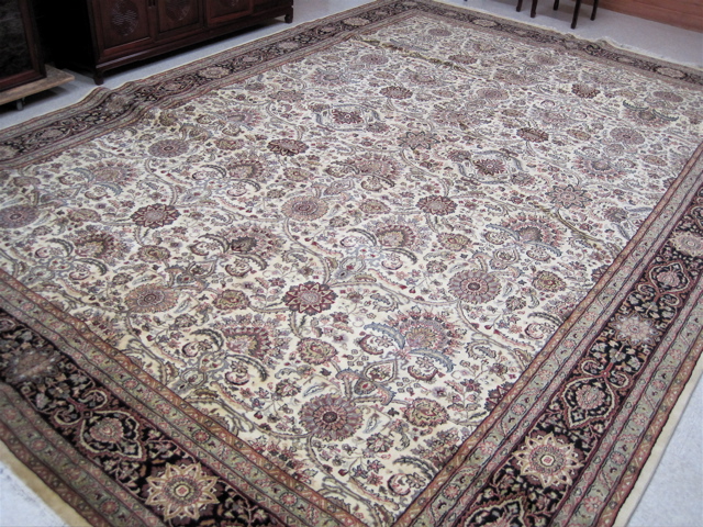 Appraisal: LARGE HAND KNOTTED ORIENTAL CARPET Indo-Persian having a floral decorated