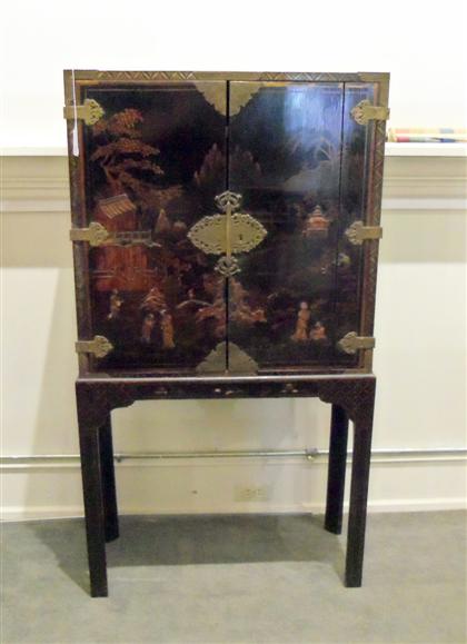 Appraisal: Japanese black lacquer chest on stand th century