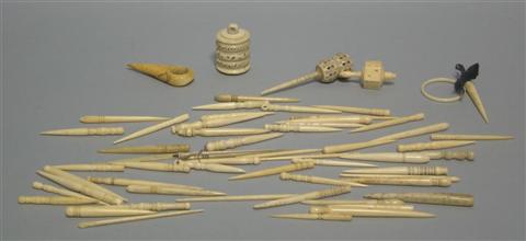 Appraisal: GROUP OF IVORY AND BONE NOVELTIES Including rattles needle cases