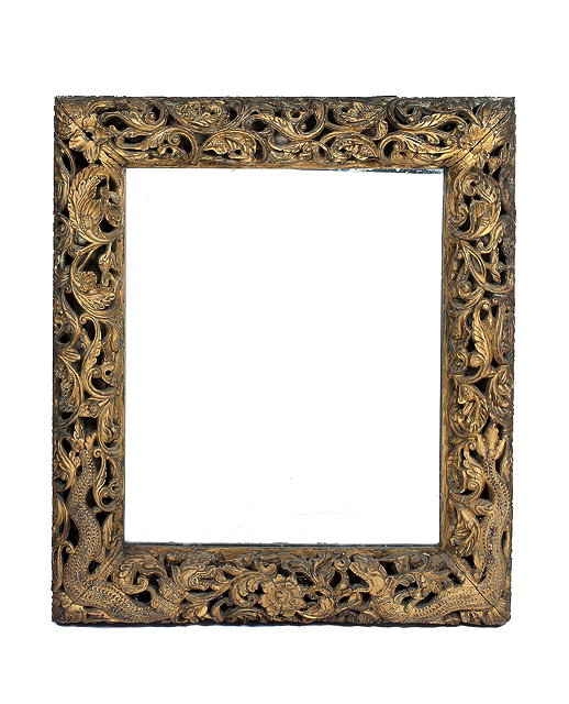 Appraisal: A DECORATIVE RECTANGULAR WALL MIRROR a pierced gilt carved frame