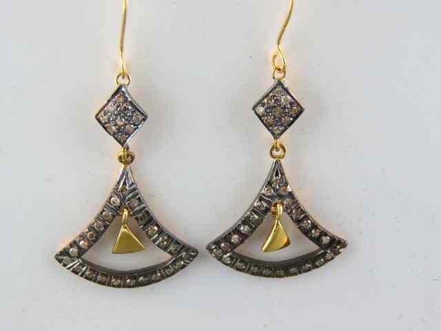 Appraisal: Diamond Earrings approx diamonds totaling carat in gold silver settings