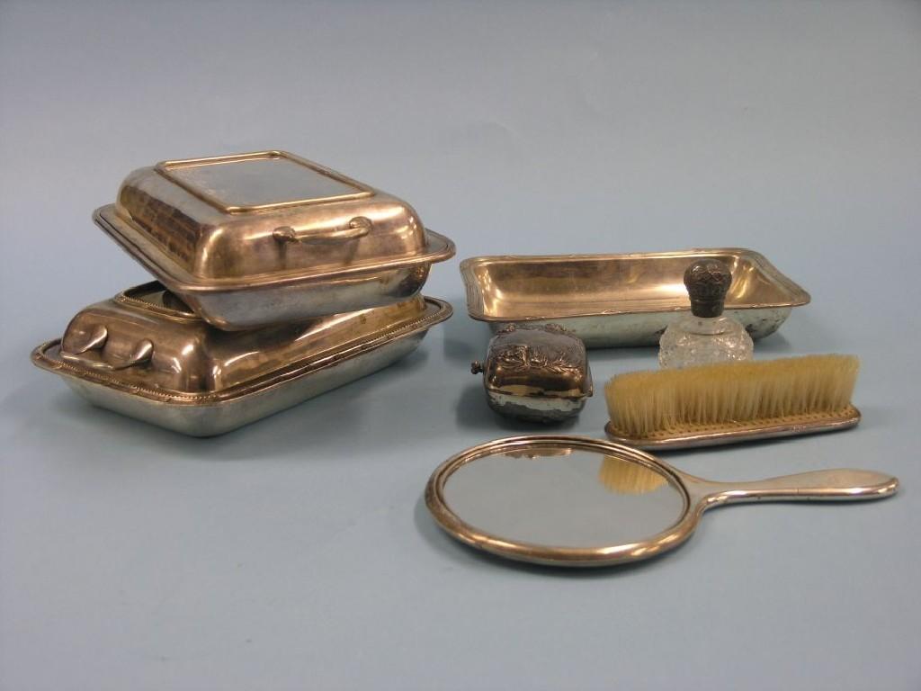 Appraisal: A silver-mounted tortoiseshell handbrush and clothes brush silver-mounted scent bottle