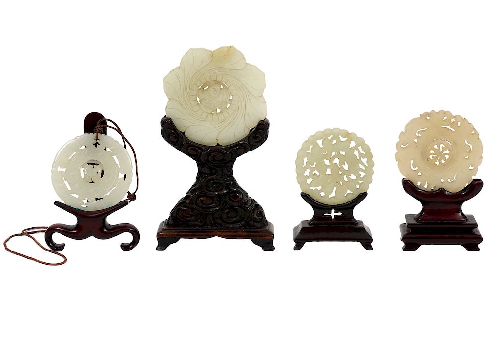 Appraisal: Jade Carved Discs in Wood Stands assorted Chinese carved jade