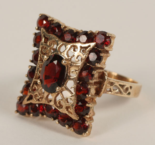 Appraisal: Gold marked K Victorian style garnet ring with openwork detailing