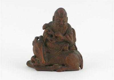 Appraisal: A small Chinese bamboo carving of Shoulao holding a ruyi