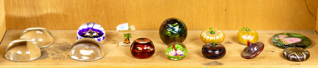 Appraisal: ONE SHELF OF ART GLASS PAPERWEIGHTS One shelf of art