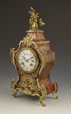 Appraisal: A French boulle cartouche shape mantel clock having an eight