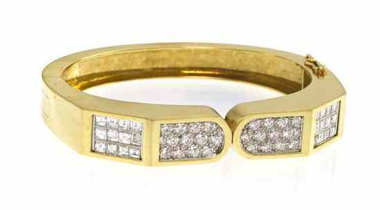 Appraisal: An Karat Yellow Gold Platinum and Diamond Bracelet containing round