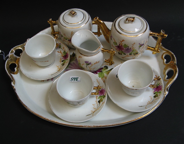 Appraisal: TEN PIECE PORCELAIN HAND PAINTED CHILD'S TEA SET c 's