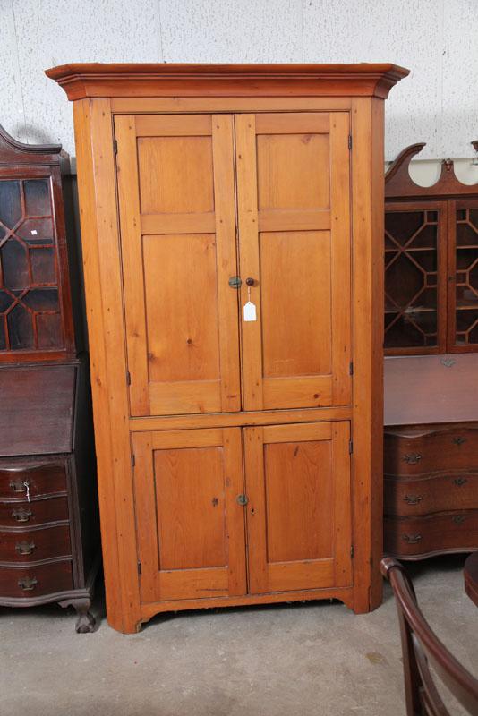 Appraisal: CORNER CUPBOARD Pine with step molded cornice paneled blind doors