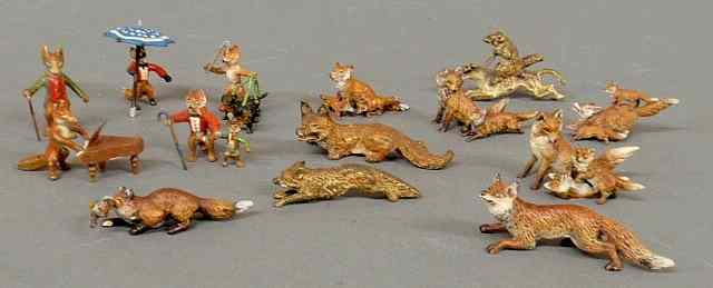 Appraisal: Fourteen miniature cold painted bronze foxes tallest h