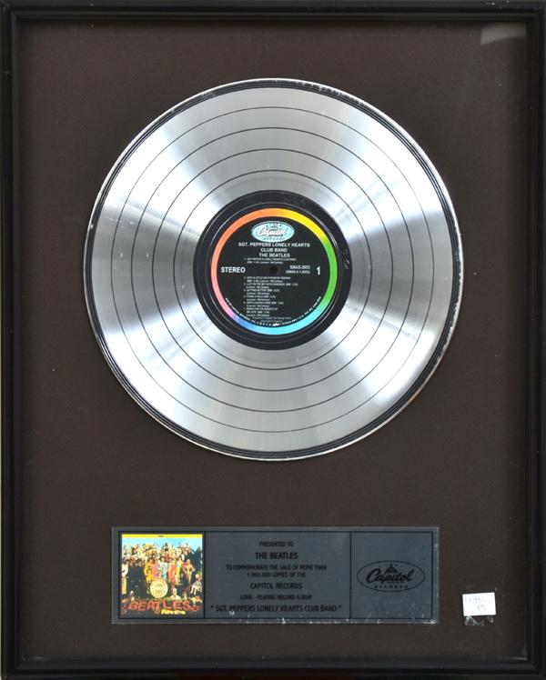 Appraisal: PRESENTATION PLATINUM DISC FOR 'SGT PEPPERS LONELY HEART'S CLUB BAND'