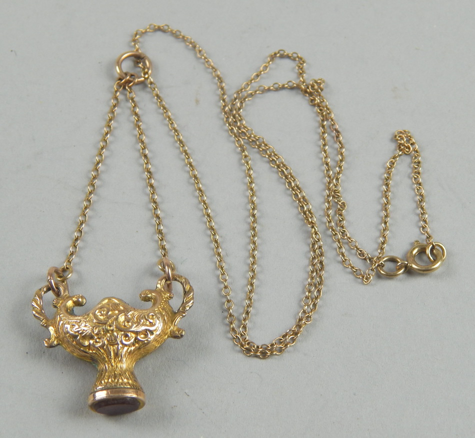 Appraisal: An Eastern pendant and chain in the form of an