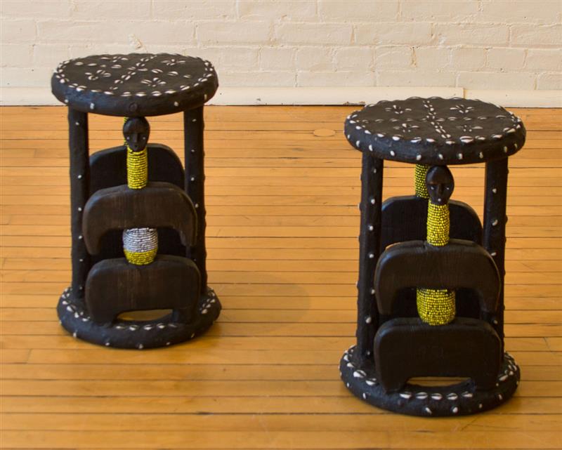 Appraisal: PAIR OF CARVED AND BEADED FIGURAL AFRICAN STOOLS x in