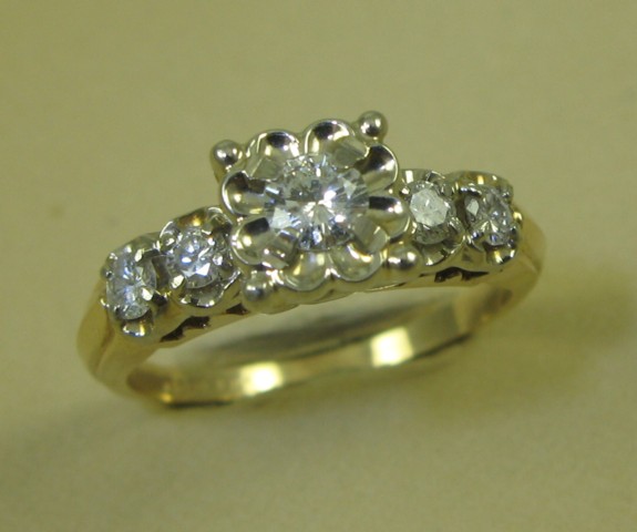 Appraisal: DIAMOND AND FOURTEEN KARAT GOLD RING with appraisal The ring