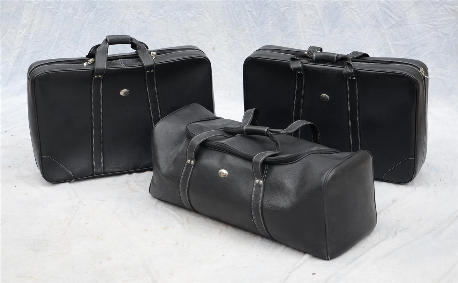 Appraisal: Three Pieces Handmade Leather Luggage by Schedoni for Mercedes-Benz Italian