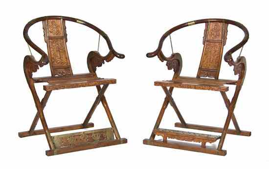 Appraisal: A Pair of Chinese Horseshoe Back Folding Chairs having brass