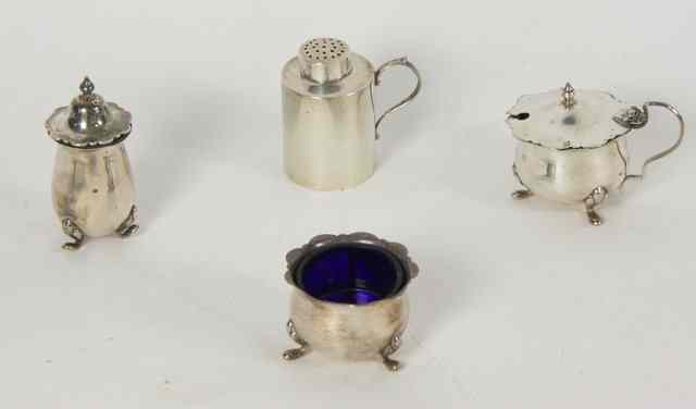 Appraisal: A silver three-piece cruet set ALD Birmingham comprising salt pepper