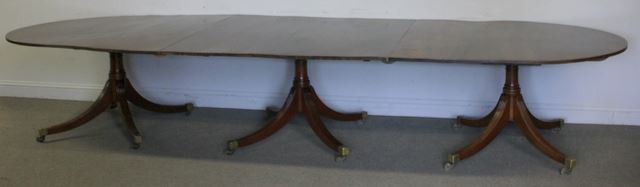 Appraisal: Antique Mahogany Triple Pedestal Dining Table A magnificent probably th