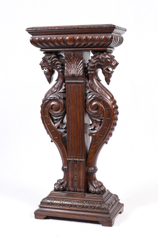 Appraisal: CARVED GRIFFIN PEDESTAL STAND Rectangular top with carved trim body