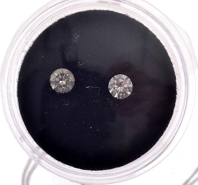 Appraisal: TWO LOOSE ROUND BRILLIANT CUT DIAMOND WEIGHING APPROXIMATELY CTS TWO