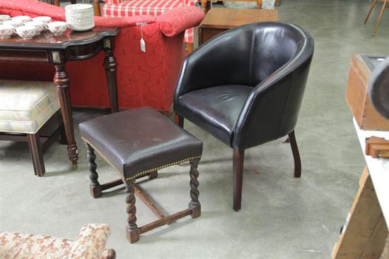 Appraisal: LEATHER CHAIR AND OTTOMAN Barrel form chair on tapered legs