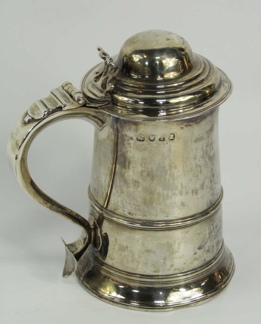 Appraisal: A George III silver lidded tankard by Hester Bateman with