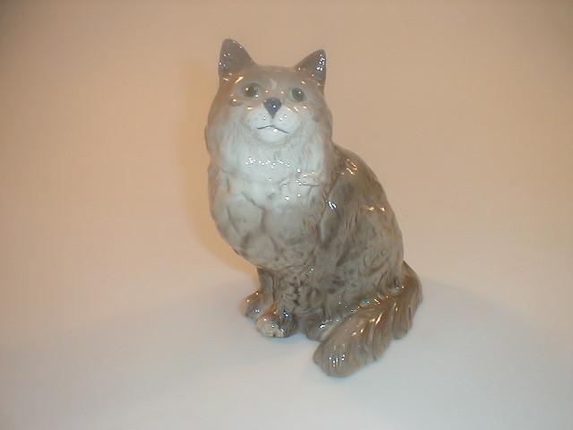 Appraisal: A Beswick Persian cat model no seated looking up grey