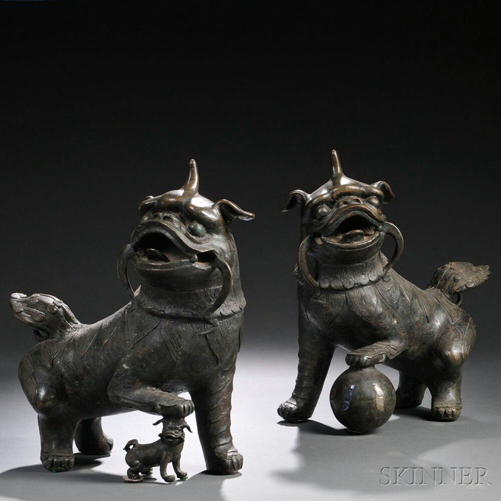 Appraisal: Pair of Bronze Foo Dogs China th century looking up