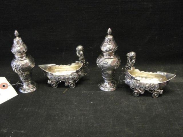 Appraisal: Pair of Ship-Form Salts along with a Pair of Casters