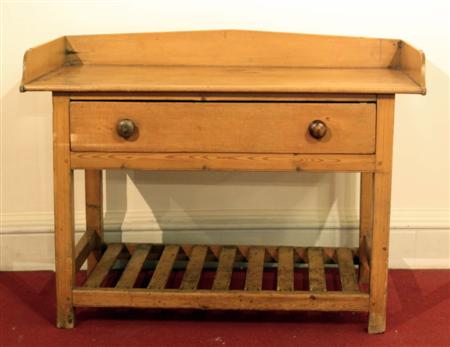 Appraisal: A Victorian pine kitchen side table the rectangular top with