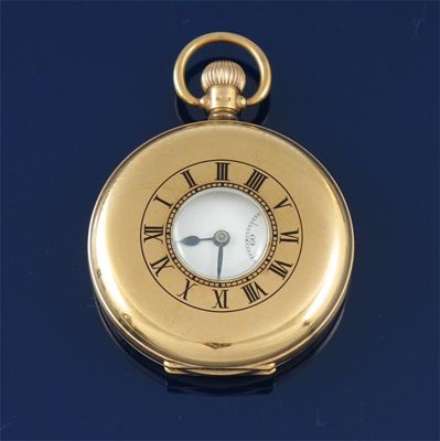 Appraisal: A ct gold half hunting cased pocket watch Engraved with