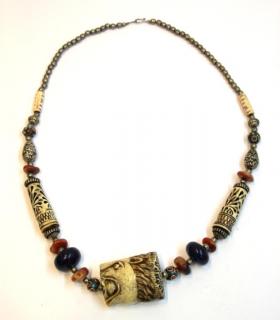 Appraisal: Ethnographic Lion Head Necklace Consisting of silver-tone metal carnelian resin