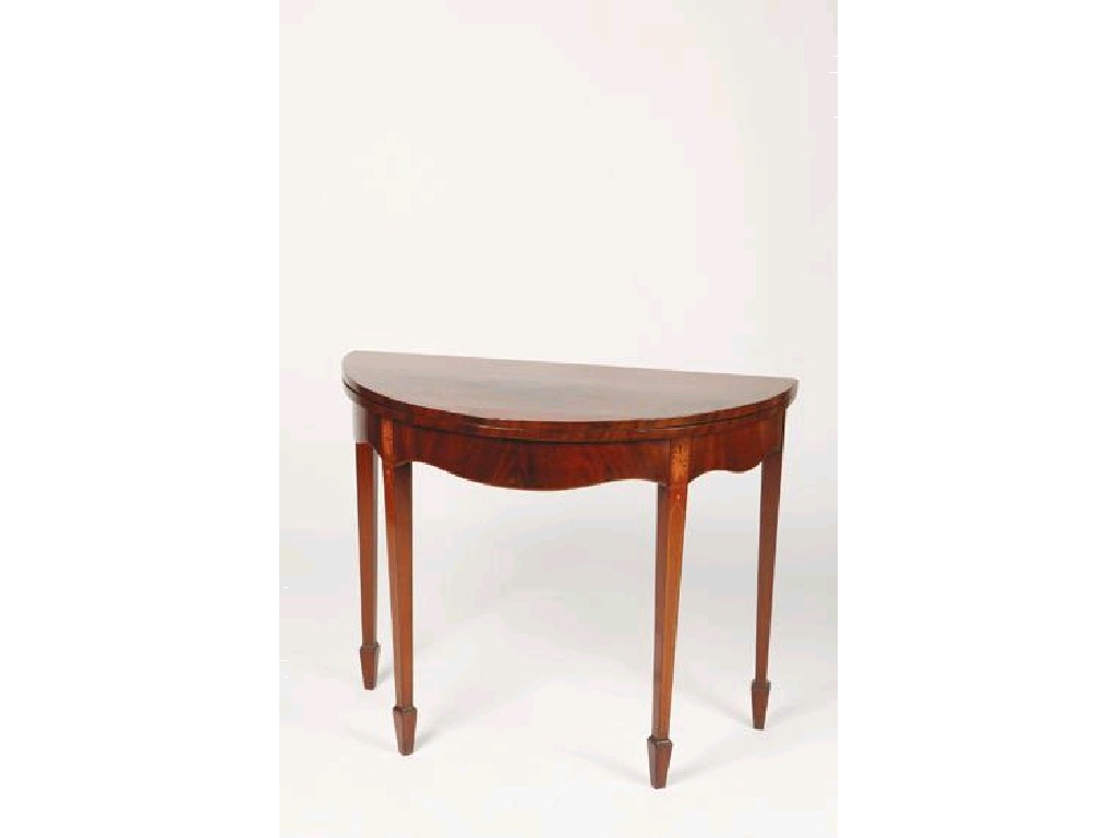 Appraisal: A GEORGE III MAHOGANY TEA TABLE of Sheraton design inlaid