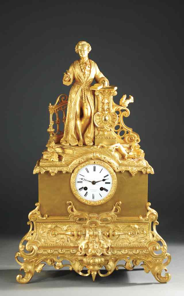 Appraisal: FRENCH GILT BRONZE FIGURAL MANTEL SHELF CLOCK The time and