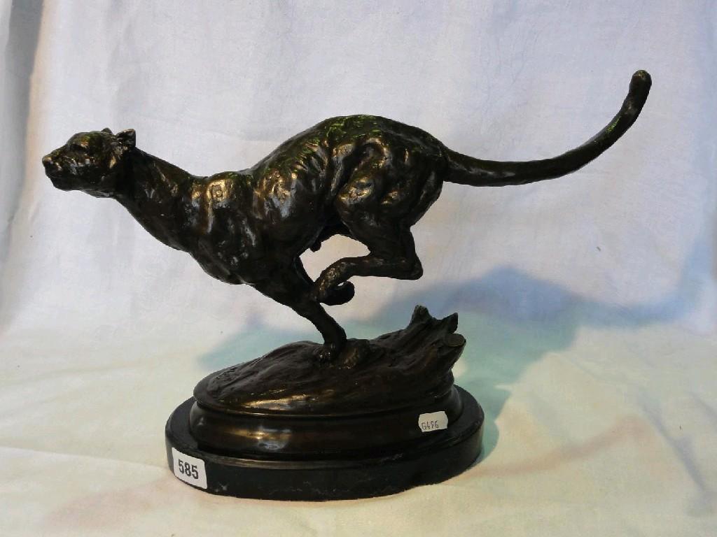 Appraisal: A bronze of a sprinting cheetah after the original by