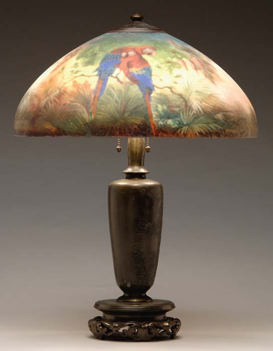 Appraisal: HANDEL MACAW LAMP Beautiful reverse painted shade has brightly colored