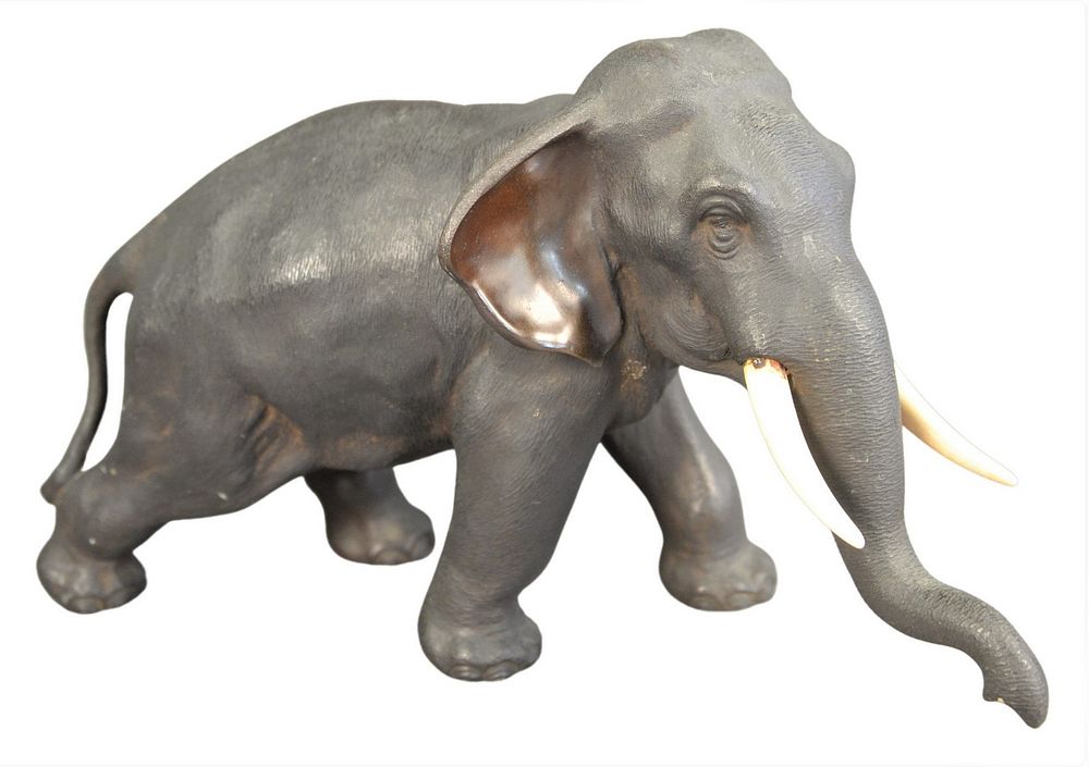 Appraisal: Chinese Bronze Elephant Sculpture having white tusks marked with three