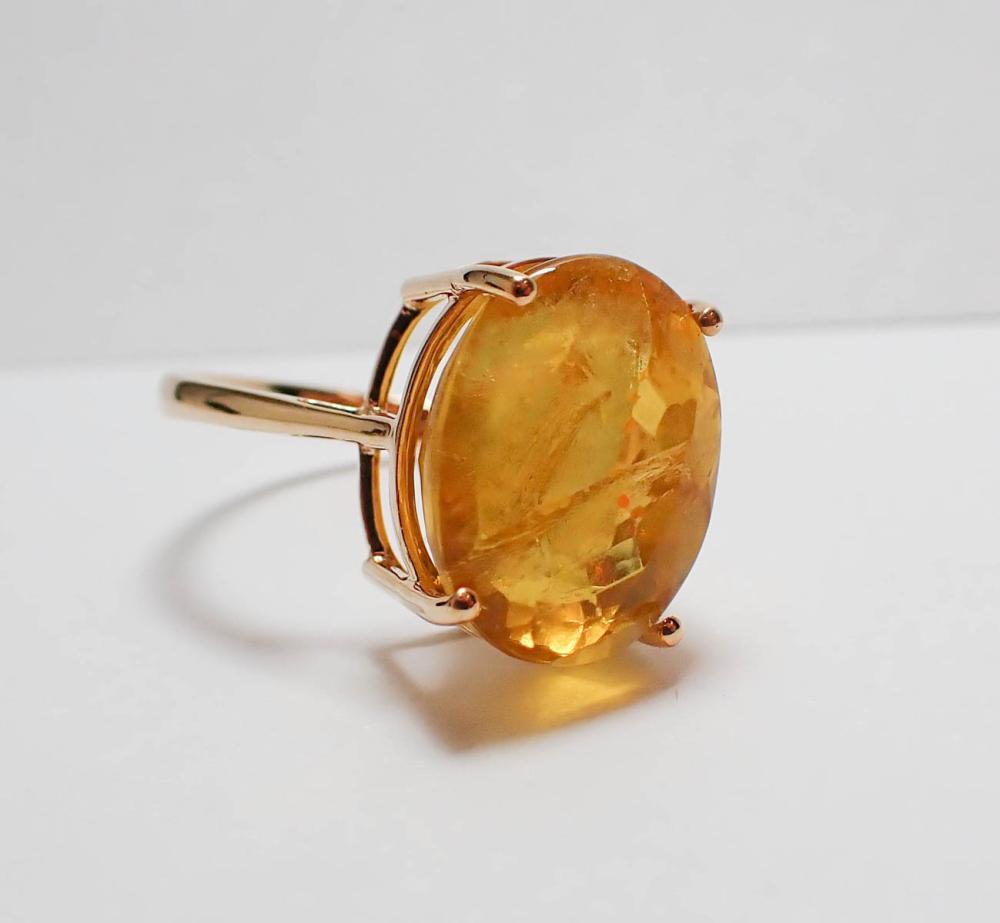 Appraisal: YELLOW FLUORITE AND FOURTEEN KARAT GOLD RING The k yellow