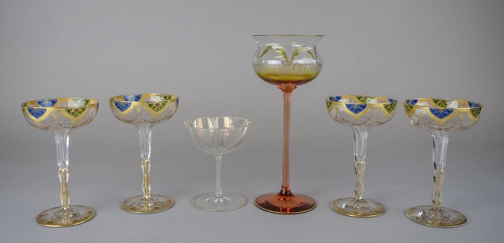 Appraisal: Stemware Grouping champagne coupes with gold green blue decoration H