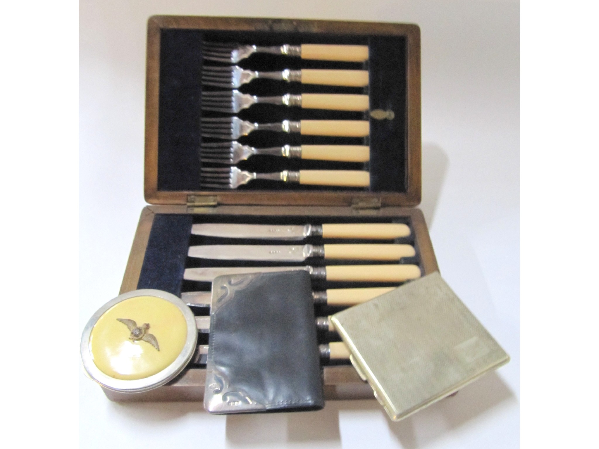 Appraisal: A lot comprising a cased twelve piece fish cutlery set