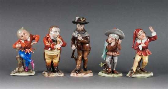 Appraisal: Four Capodimonte porcelain musicians and jester figure all dressed in