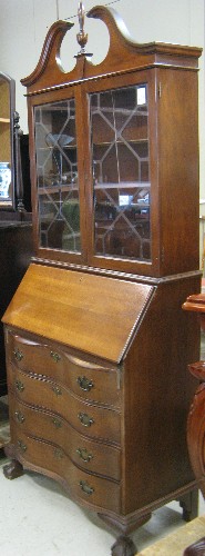 Appraisal: CHIPPENDALE STYLE MAHOGANY SECRETARY BOOKCASE American mid th century The